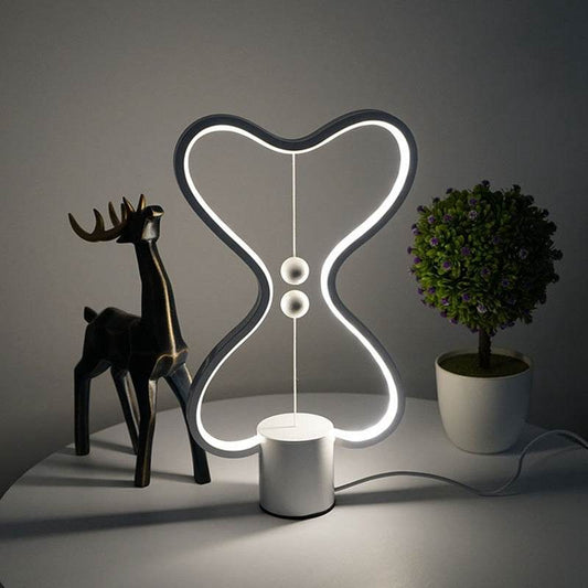 7 Colors Balance Lamp LED night light with floating balls and USB power on a wooden table