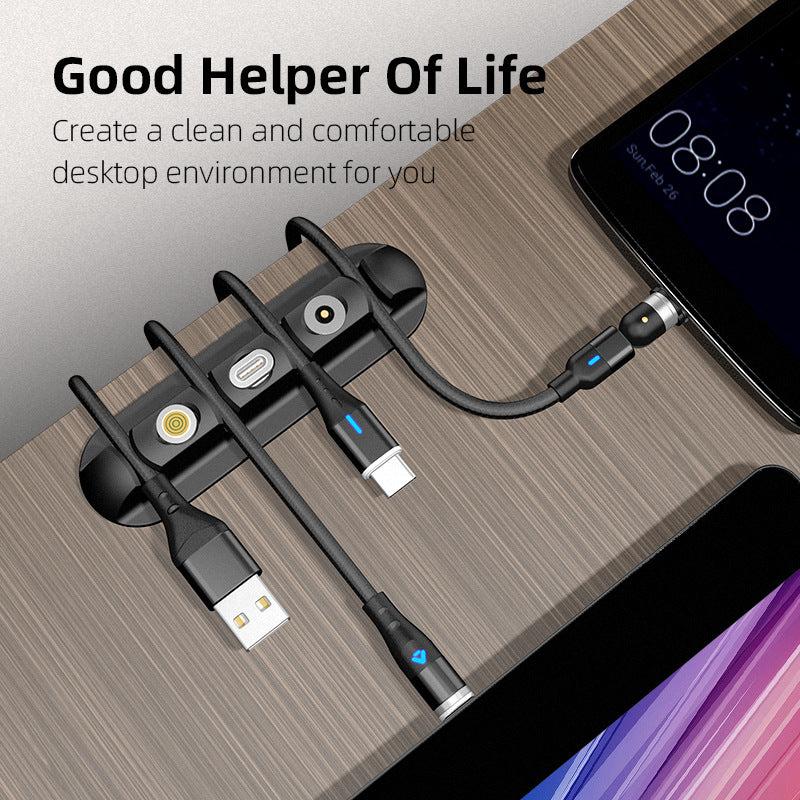 Black desktop charging magnetic cable organizer with soft plastic design for neat data cable storage