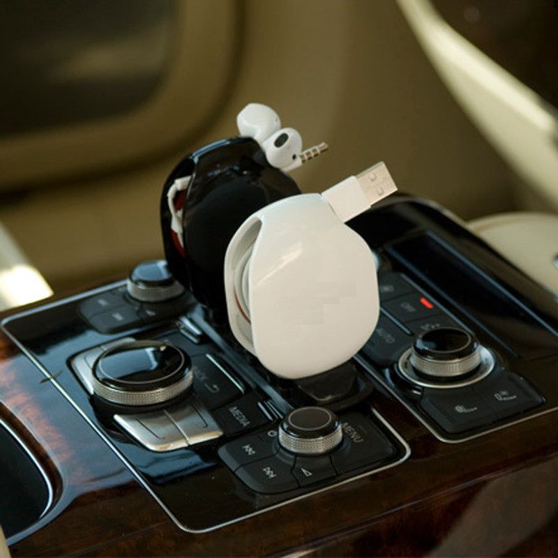 Compact automatic earphone retractor reel in multiple colors for cable management